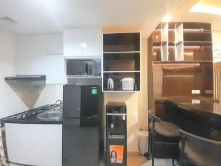 Spacious and Elegant 1BR at Patraland Amarta Apartment By Travelio - Kejayan - 1