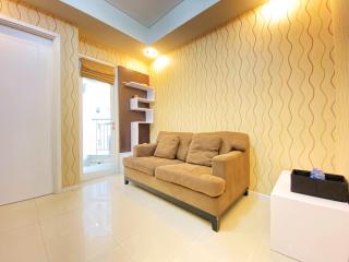 Cozy Living 1BR Apartment at Parahyangan Residence By Travelio - 1