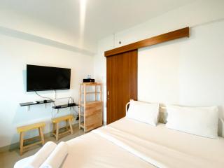 Modern and Homey 1BR without Living Room at Grand Kamala Lagoon Apartment By Travelio - 2