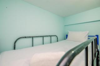 Comfort and Cozy Living 2BR at Cibubur Village Apartment By Travelio - Depok - 2