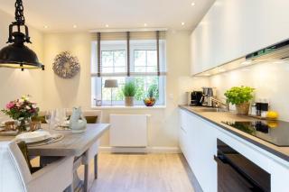 Ferienwohnung Neptuns Garden Haffkrug - 1