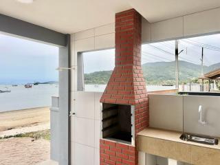 Pé na areia! Aconchegante casa frente Mar! CO02I - 0