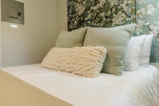 Centrally Located Memphis Tiny Home Queen Bed REAR - 0