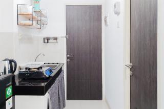Restful and Comfortable Studio Serpong Garden Apartment By Travelio - 1