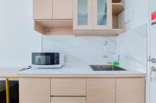 Homey Studio (No Kitchen) Urbantown Serpong Apartment By Travelio - 9