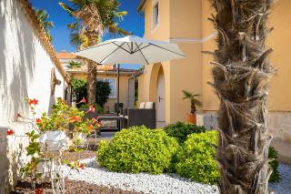 Idyllisches Apartment mit mediterranem Garten, BBQ - nur 15 Minuten zum Strand - 8