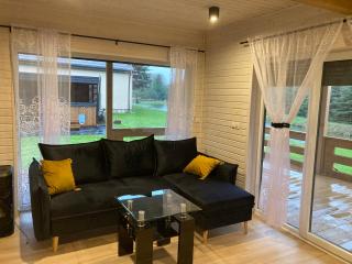 Domek drewniany nad stawem z sauną i jakuzzi - Międzyborów - 3