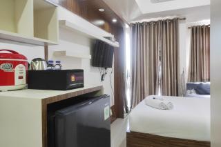 Convenient Studio Apartment at Vida View Makassar By Travelio - Pampang - 8