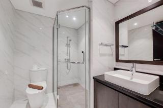 Comfy 1BR Apartment with Motorized Standing Desk at Branz BSD City By Travelio - 6
