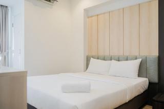 Comfy 1BR Apartment with Motorized Standing Desk at Branz BSD City By Travelio - 4