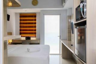 Comfy and Minimalist Studio Apartment at Mustika Golf Residence By Travelio - Bekasi - 3