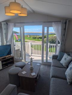 STYLISH HOLIDAY HOME WITH UNINTERRUPTED VIEWS OF THE FLEET LAGOON ON Haven LITTLESEA HOLIDAY PARK - 0