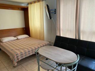 Departamento cercano Movistar Arenas 703 - 4