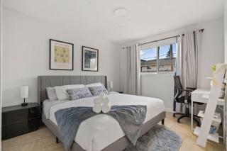 Spacious 4-Bedroom Retreat Near Bow River with Foosball, Dart Board, Movie Room - 9