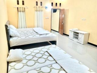 UNIQDO Inn Tomok - Tomok - 4