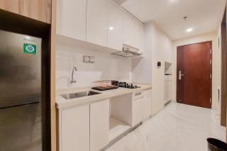Spacious and Homey 2BR at Sky House BSD Apartment By Travelio - 7