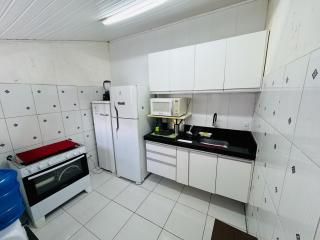 Casa de Praia com Piscina e Churrasqueira a 280m da Praia do Morro - 3 quartos com Ar Condicionado, sendo 2 suítes- Quintal amplo, ideal para famílias - 4