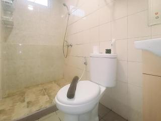 Modern 2BR Green Pramuka City Apartment near Shopping Center By Travelio - 1