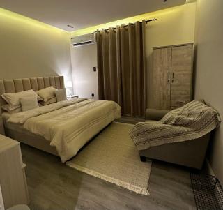 Self-Entry Apartment in Almasif Living Room and Bedroom - 4