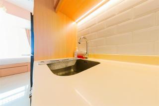 Homey and Modern Studio at Tree Park City Cikokol Apartment By Travelio - 2