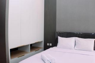 Modern Look and Restful Studio at 32th Floor Vasanta Innopark Apartment By Travelio - Bekasi - 1