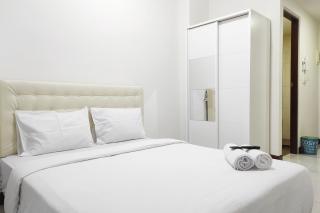 Simply Homey Studio at Vida View Apartment By Travelio - Pampang - 9