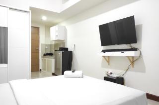 Simply Homey Studio at Vida View Apartment By Travelio - Pampang - 8