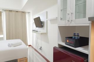 Homey and Tidy Studio Apartment at Vida View Makassar By Travelio - Pampang - 1