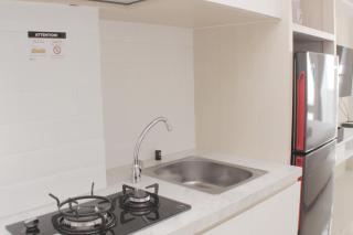 Warm and Cozy Stay Studio at Vasanta Innopark Apartment By Travelio - Bekasi - 2