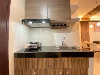 Cozy Well Furnished Deluxe 2BR at Gateway Pasteur Apartment By Travelio - Bandung - 1