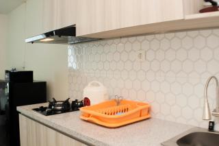 Elegant and Comfy Studio at Grand Kamala Lagoon Apartment By Travelio - 1