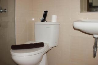 Comfort Studio at Oasis Cikarang Apartment By Travelio - Bekasi - 8