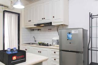 White and Nice 1BR at Bassura City Apartment By Travelio - 2