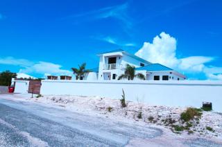 Stay in a Long Bay Beach Villa with a Shared Pool - Long Bay Hills - 1