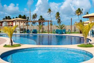 Apartamento 3/4 decorado em condomínio frente mar - Baixio - 4