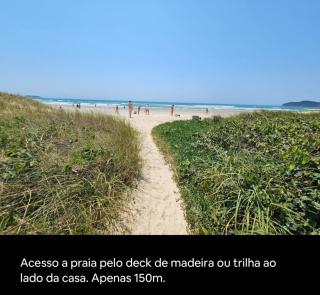 Casa com piscina frente ao mar Praia do Santinho - Florianópolis - 5