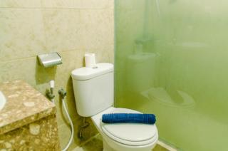 Simply and Cozy Pool View 2BR at Great Western Apartment By Travelio - 1