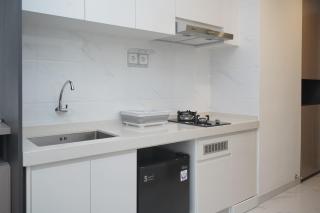 Fully Furnished with Tidy Design Studio at Sky House BSD Apartment By Travelio - Tangerang - 6