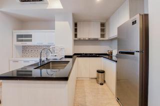 Comfort 2BR at Branz BSD City Apartment By Travelio - Tangerang - 2