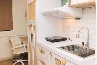 Minimalist Design Studio at Meikarta Apartment By Travelio - Bekasi - 3
