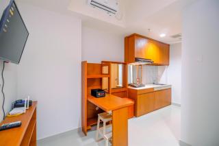 Comfort 1BR at Evenciio Margonda Apartment By Travelio - 9