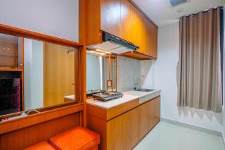 Comfort 1BR at Evenciio Margonda Apartment By Travelio - 7