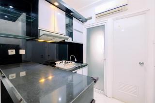 Best Deal and Modern 1BR Green Pramuka City Apartment By Travelio - 1