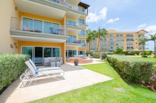 Beachfront - Garden Delight 3BR condo - E125 - Palm-Eagle Beach - 3