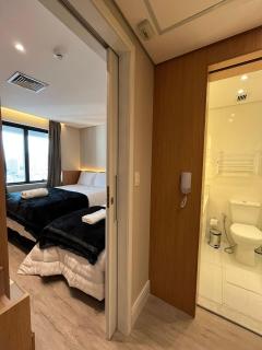 Flat Hotel Slaviero GRU 2 Quartos até 6p | Delfhy - 3