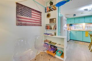 Walk to Manistee Lake Retro Cottage with Fire Pit! - 1