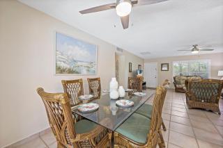 Cozy home with sunroom, pool and steps to beach - 5
