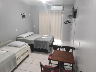 Estúdios Individual na Meia Praia ar, wifi, vaga, cozinha, tv smart - 6 x no cartão sem juros - 9