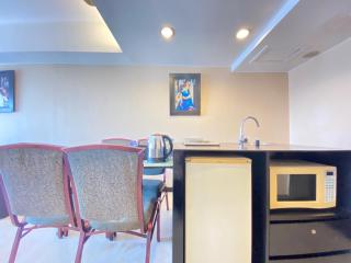 Gorgeous & Classic 2BR at Braga City Walk Apartment By Travelio - Bandung - 3