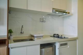 Fully Furnished with Modern Design Studio Sky House BSD Apartment By Travelio - 7